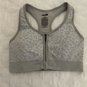 Avia front zip grey and white cheata print sports bra. Large.  NWOT